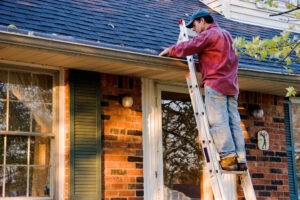 cleaning gutters photo